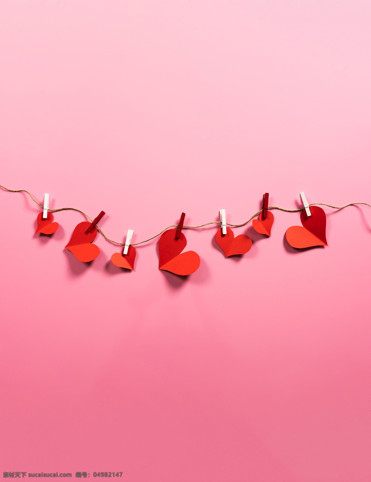 心形纸 折纸 心 粉色背景 背景素材 可爱 爱情 情人节 七夕 庆祝 纪念 设计素材 生活百科 生活素材