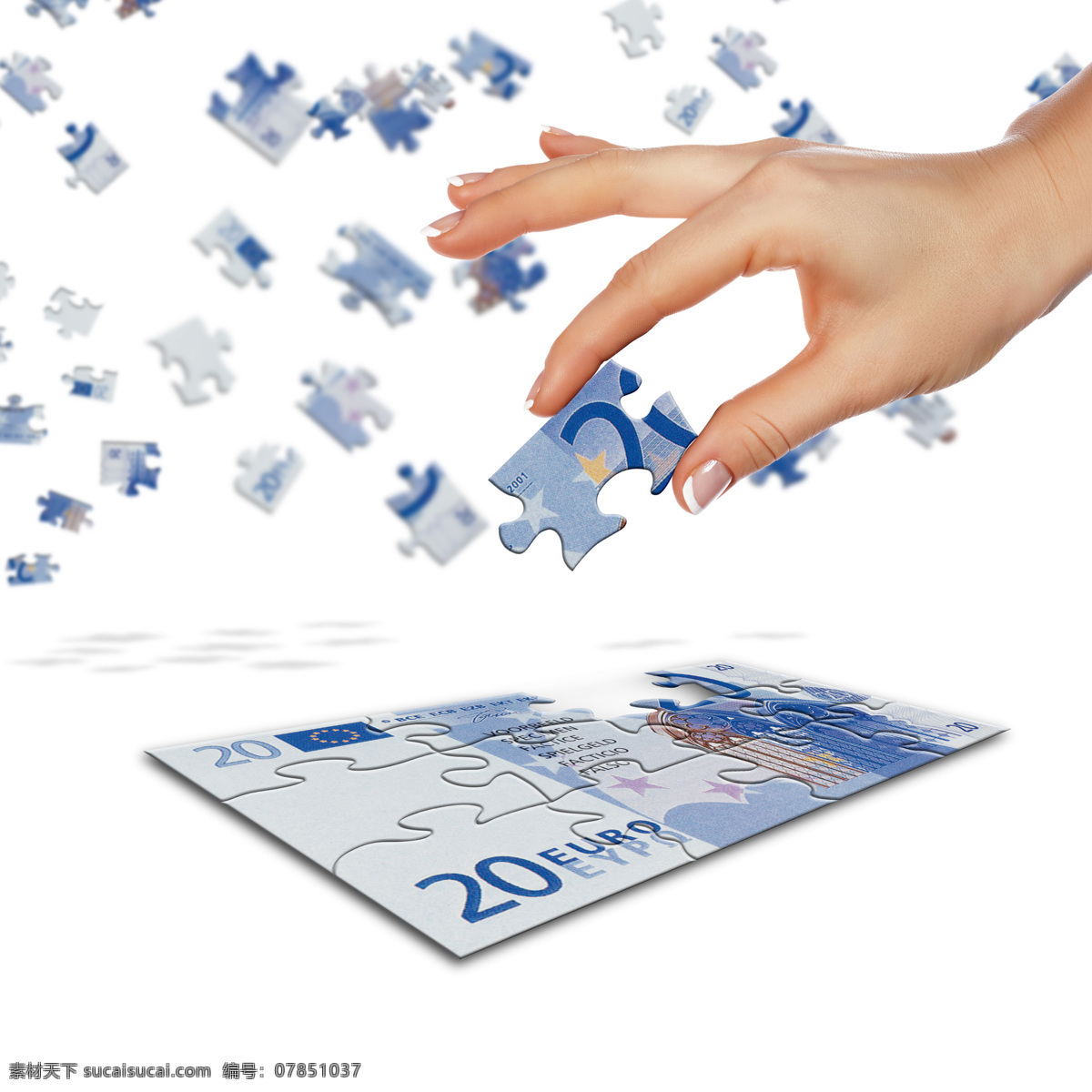 欧元 拼图 手部 特写 拿着 手势 手型 欧元拼图 玩具 金融 商业 智力拼图 高清图片 金融货币 商务金融